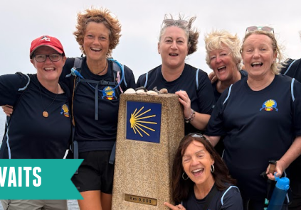 A group of Adventure Geek pilgrims at the zero-mile marker at Finisterre, also known as the end of the world